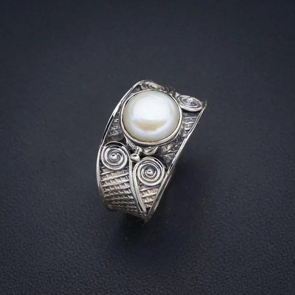 Bohemian Spirit Pearl Ring on finger-silver bohemian pearl ring-boho style pearl ring-shell ring