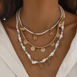 Boho_Coastal_Multi-Strand_Shell_and_Coin_Necklace-shell jewelry-boho style-beach outfit-boho chic style-bohemian jewelry-coastal look-beach style