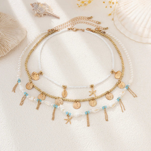 Boho_Coastal_Multi-Strand_Shell_and_Coin_Necklace-shell jewelry-boho style-beach outfit-boho chic style-bohemian jewelry-coastal look-beach style
