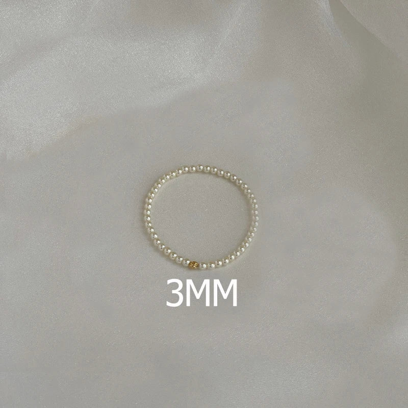 Dainty_Beaded_Pearl_Bracelet-shell jewelry-boho style-beach outfit-boho chic style-bohemian jewelry-coastal look-beach style-wedding style