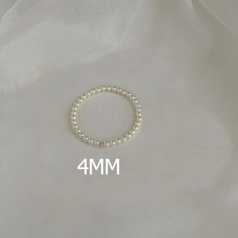 Dainty_Beaded_Pearl_Bracelet-shell jewelry-boho style-beach outfit-boho chic style-bohemian jewelry-coastal look-beach style-wedding style