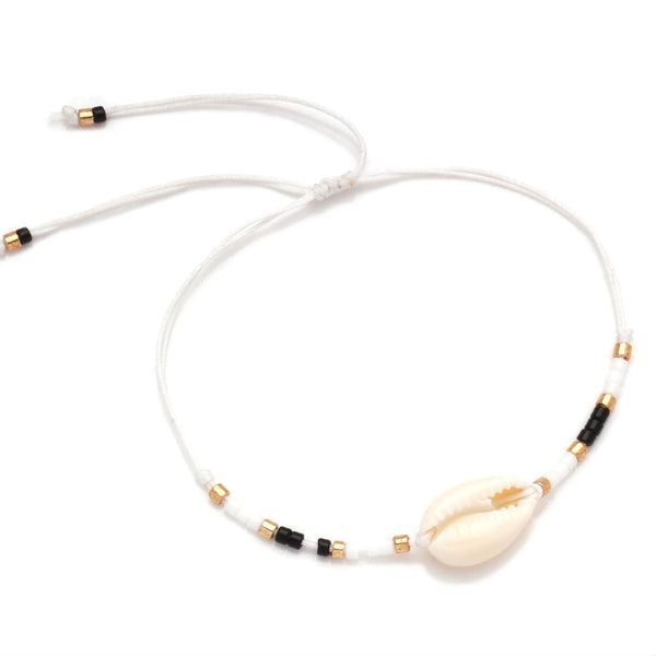 Drift & Glow Cowrie Bracelet for Boho Beach Souls_shell bracelet-
coastal look-beach style-shell jewerly-
-seashell jewelry-coastal jewelry-beach outfit-bohostyle-bohemian outfit