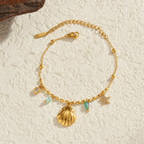 Gold_Cowrie_Shell_Rainbow_Gemstone_Bracelet-shell jewelry-boho style-beach outfit-boho chic style-bohemian jewelry-coastal look-beach style