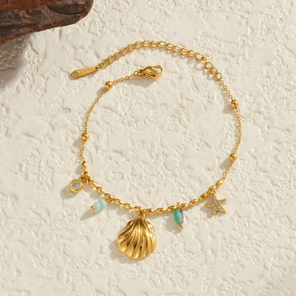 Gold_Cowrie_Shell_Rainbow_Gemstone_Bracelet-shell jewelry-boho style-beach outfit-boho chic style-bohemian jewelry-coastal look-beach style