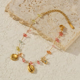 Gold_Cowrie_Shell_Rainbow_Gemstone_Bracelet-shell jewelry-boho style-beach outfit-boho chic style-bohemian jewelry-coastal look-beach style