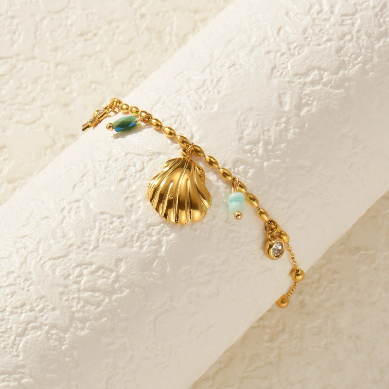 Gold_Cowrie_Shell_Rainbow_Gemstone_Bracelet-shell jewelry-boho style-beach outfit-boho chic style-bohemian jewelry-coastal look-beach style