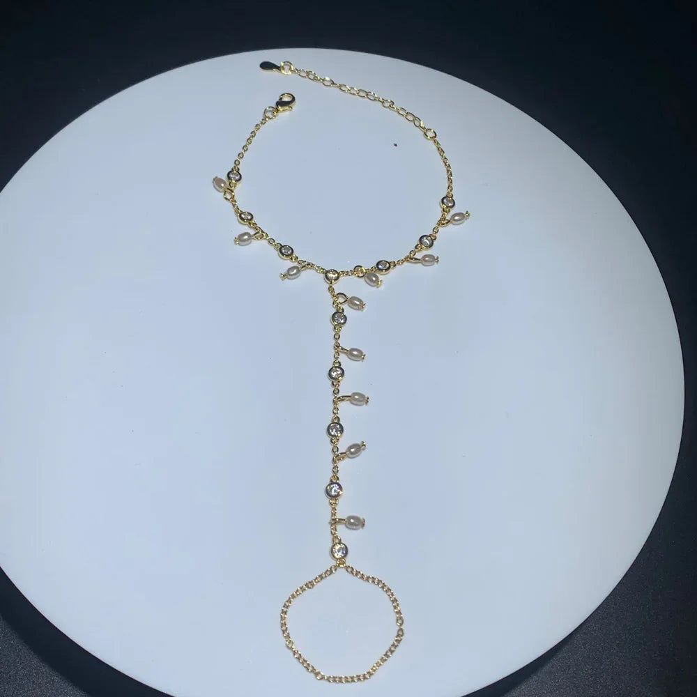 Gold_Pearl_Zirconia_Hand_Chain_Bracelet-hand bracelet-shell bracelet-shell jewelry-boho style-beach outfit