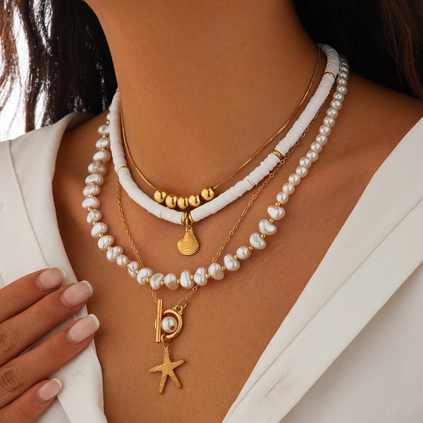 Gold_Starfish_Pearl_Layered_Shel-shell jewelry-boho style-beach outfit-boho chic style-bohemian jewelry-coastal look-beach style