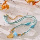 Nautilus_Gold_Shell_Pendant_Necklace- shell necklace-shell jewelry-turquoise necklace-nautilus charm shell necklace-boho style-beach outfit