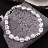 Polished Ocean Pebble Bracelet-shell jewelry-boho style-beach outfit-boho chic style-bohemian jewelry-coastal look-beach style