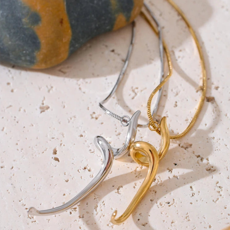 Sculptural_Flow_Pendant_Necklace-shell necklace-beach vibe-beach outfit-beach jewelry-shell jewelry- boho chic style