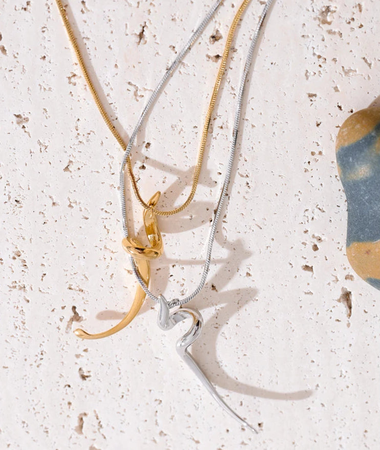 Sculptural_Flow_Pendant_Necklace-shell necklace-beach vibe-beach outfit-beach jewelry-shell jewelry- boho chic style