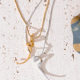 Sculptural_Flow_Pendant_Necklace-shell necklace-beach vibe-beach outfit-beach jewelry-shell jewelry- boho chic style