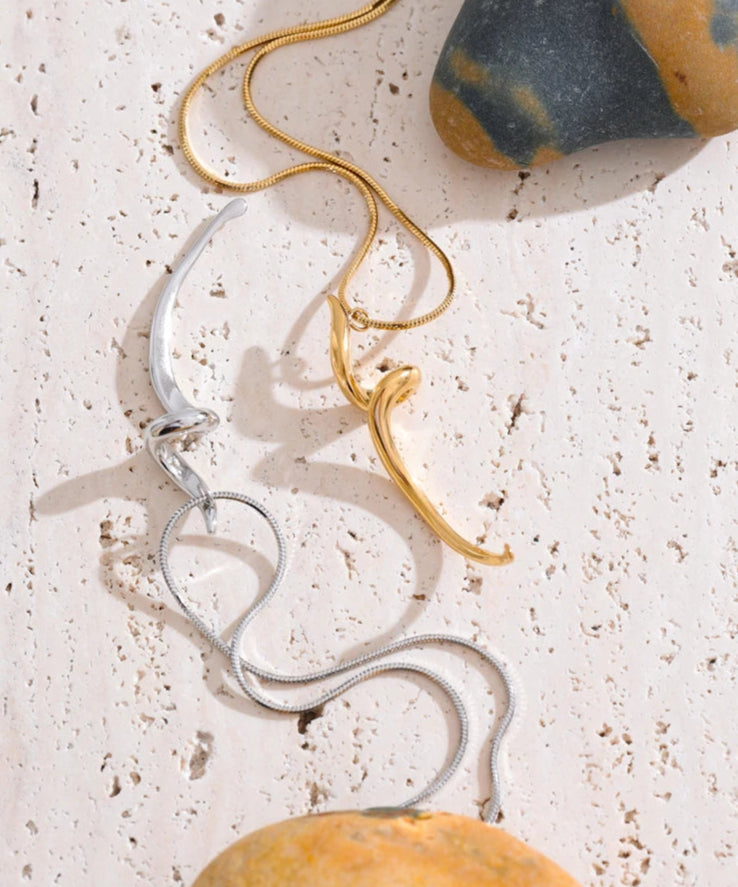 Sculptural_Flow_Pendant_Necklace-shell necklace-beach vibe-beach outfit-beach jewelry-shell jewelry- boho chic style