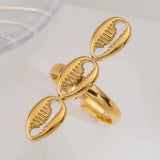 Cowrie Charm Open Ring-golden owrie ring-gold cowrie ring-shell ring-shell jewelry-beach outfit ring-beach style-boho style-bohemian jewelry