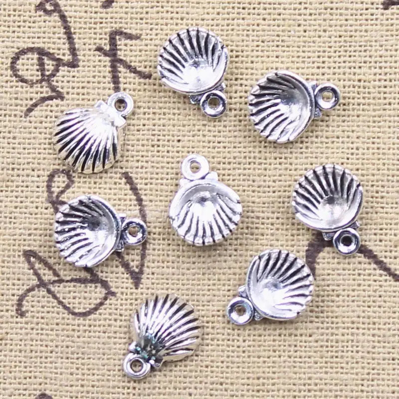 silver-shell-charms-Shell Charms-shell jewelry-shell pendants-boho chic style-bohemian jewelry-beach outfit jewelry