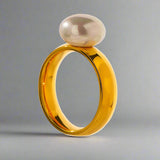 spherical-pearl-solitaire-ring-solitaire pearl ring-golden solidaire pearl ring-shell ring-shell jewelry-beach outfit ring-beach style-boho style-bohemian jewelry