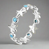 starfish-blue-harmony-ring- sterling silver starfish ring-silver shell ring- -shell ring-shell jewelry-beach outfit ring-beach style-boho style-bohemian jewelry