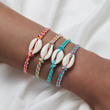 Adjustable_Cowrie_Shell_Friendship_Bracelets-shell bracelet- coastal look-beach style-shell jewerly-
shell earrings-seashell jewelry-coastal jewelry-beach outfit-bohostyle-bohemian outfit