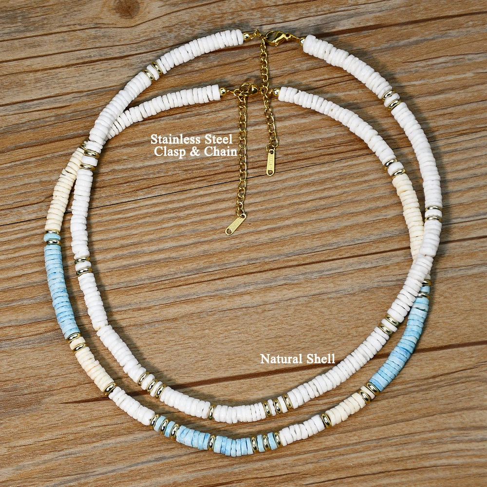 Duo of natural shell necklaces hanging with gold clasps, beach vibes aesthetic

