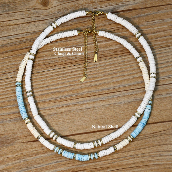 Duo of natural shell necklaces hanging with gold clasps, beach vibes aesthetic
