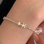 Dainty Pearl & Silver Starfish Bracelet-shell jewelry-boho style-beach outfit-boho chic style-bohemian jewelry-coastal look-beach style