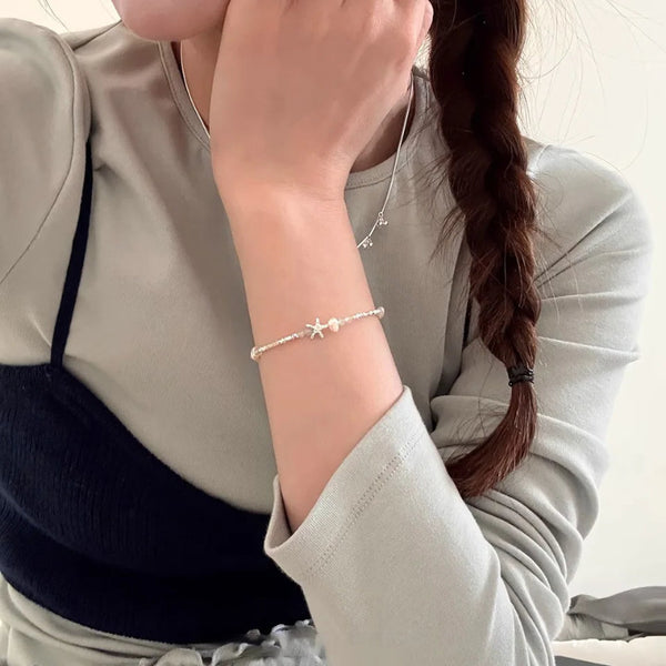 Dainty Pearl & Silver Starfish Bracelet-shell jewelry-boho style-beach outfit-boho chic style-bohemian jewelry-coastal look-beach style
