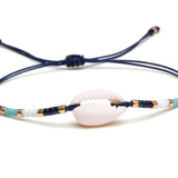 Drift & Glow Cowrie Bracelet for Boho Beach Souls_shell bracelet- 
coastal look-beach style-shell jewerly-
-seashell jewelry-coastal jewelry-beach outfit-bohostyle-bohemian outfit