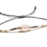 Drift & Glow Cowrie Bracelet for Boho Beach Souls_shell bracelet- 
coastal look-beach style-shell jewerly-
-seashell jewelry-coastal jewelry-beach outfit-bohostyle-bohemian outfit