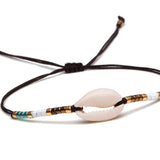 Drift & Glow Cowrie Bracelet for Boho Beach Souls_shell bracelet- 
coastal look-beach style-shell jewerly-
-seashell jewelry-coastal jewelry-beach outfit-bohostyle-bohemian outfit