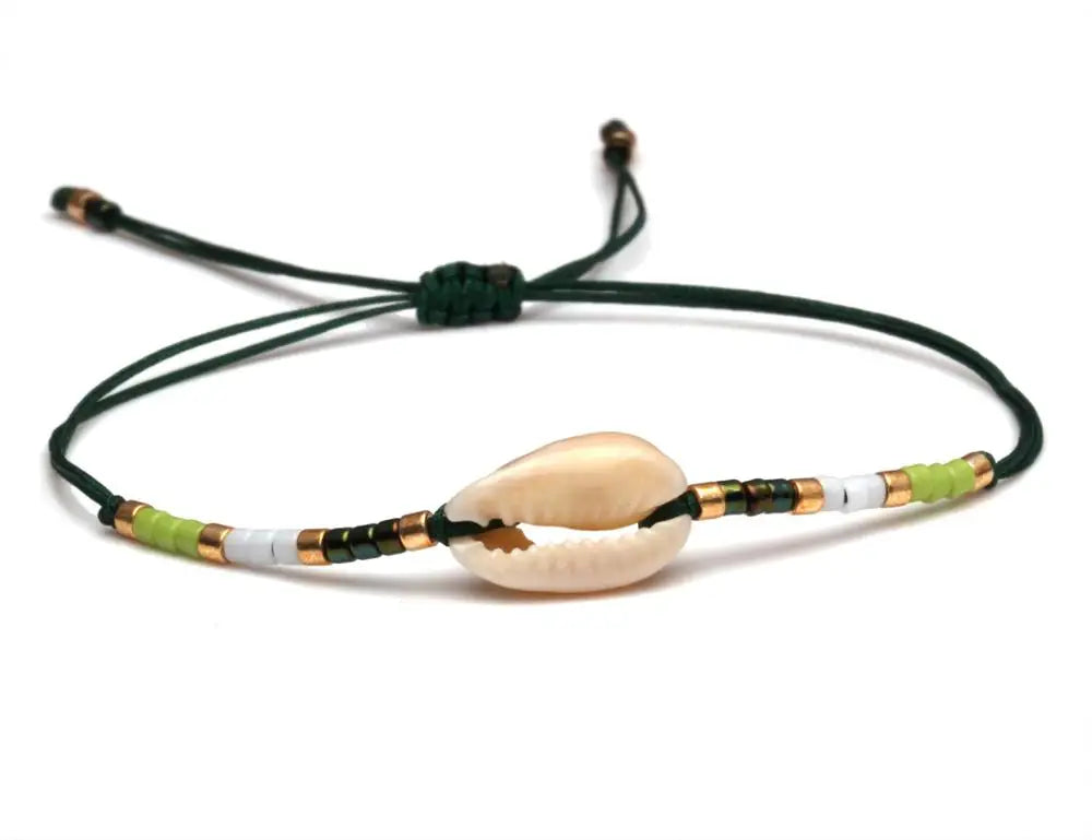 Drift & Glow Cowrie Bracelet for Boho Beach Souls_shell bracelet- 
coastal look-beach style-shell jewerly-
-seashell jewelry-coastal jewelry-beach outfit-bohostyle-bohemian outfit