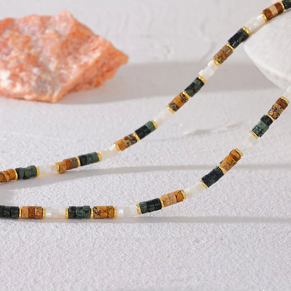 Alt Text 4: Close-up of necklace clasp and extender showcasing shell beads and earthy jasper stones in beach vibes aesthetic.