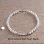 Elegant_Real_Shell_Pearl_Bracelet-shell jewelry-boho style-beach outfit-boho chic style-bohemian jewelry-coastal look-beach style-pearl bracelet