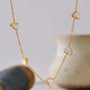 Gold-Kissed Shell Heart Necklace-shell necklace-heart necklace-mother of pearl shell necklace-shell necklace-heart necklace-mother of pearl shell necklace