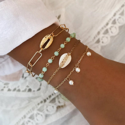 shell bracelet- coastal look-beach style-shell jewerly-shell earrings-seashell jewelry-layered braceleet-cowri bracelet