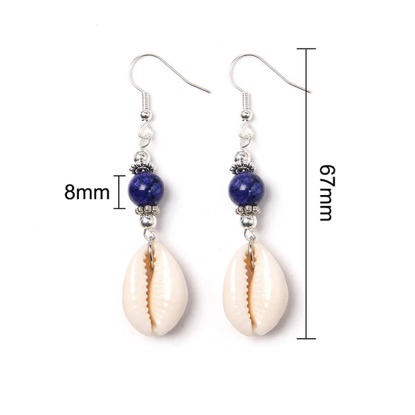 Pair of earrings with cowrie shells and blue beads, shown with measurements on a white background.