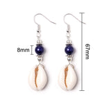Pair of earrings with cowrie shells and blue beads, shown with measurements on a white background.
