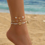 Layered Gold Starfish & Cowrie Shell Anklet Trio