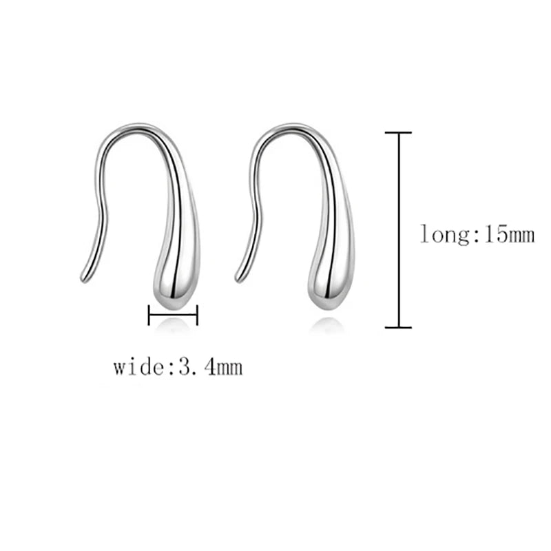 Silver  drop earrings with measurements on a white background