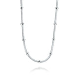 Silver necklace with small beads on a white background