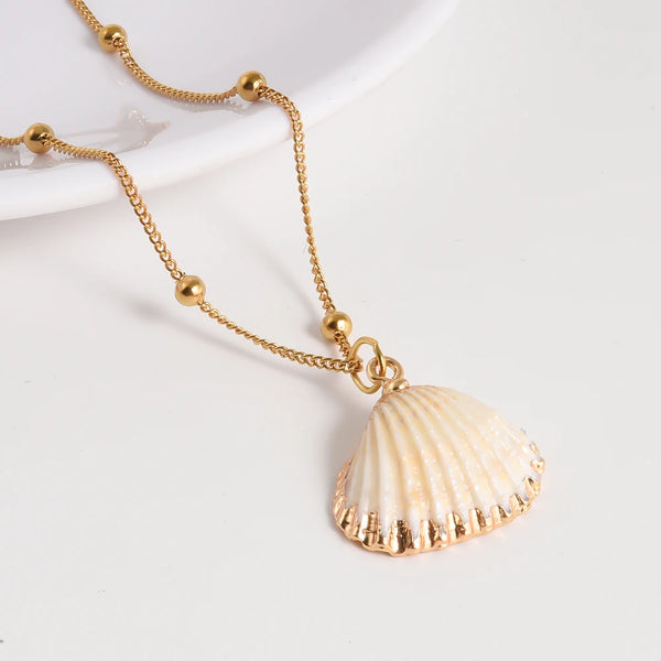 The Gilded Scallop Amulet