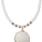 Necklace with white shell pendant and beaded chain on a white background