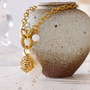 mother-of-pearl shell bracelet-charm bracelet-shell jewelry-gold bracelet golden bracelet