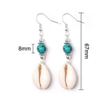 Shell earrings with turquoise beads and measurements on a white background
