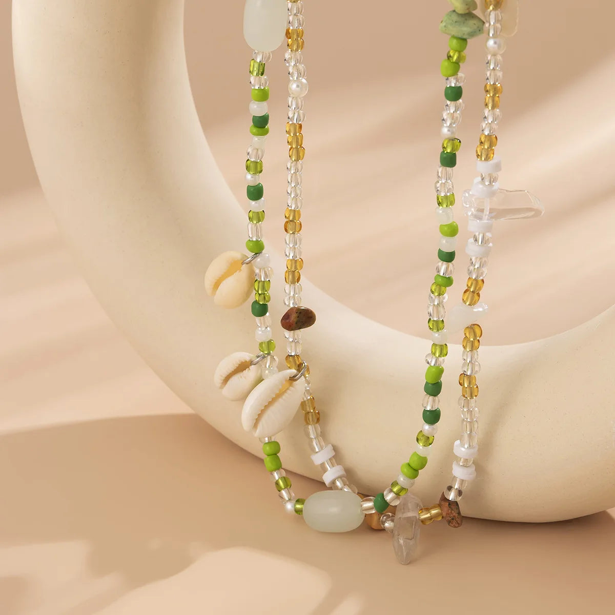 Whispers_of_the_Shoreline_Green_Shell_Belly_Chain_for_Boho_Beach_Days-coastal look-beach style-shell jewerly-
shell earrings-seashell jewelry-coastal jewelry-beach outfit-bohostyle-bohemian outfit

