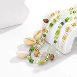 Whispers_of_the_Shoreline_Green_Shell_Belly_Chain_for_Boho_Beach_Days-coastal look-beach style-shell jewerly-
shell earrings-seashell jewelry-coastal jewelry-beach outfit-bohostyle-bohemian outfit
