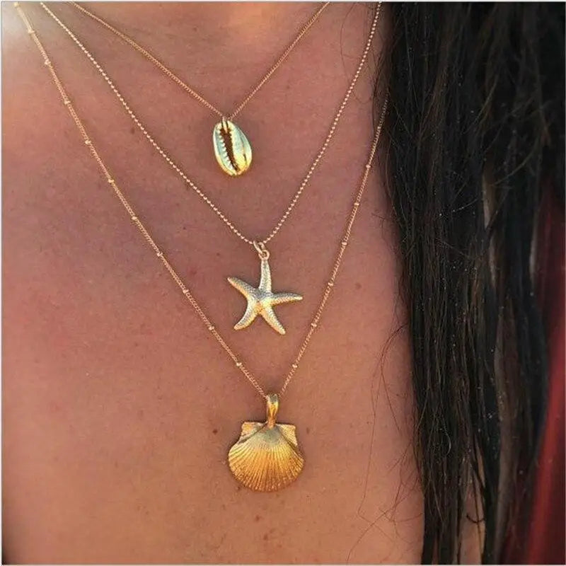 Gold Chain Necklace with Cowrie Shells and Starfish