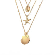 Gold Chain Necklace with Cowrie Shells and Starfish