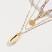 Gold Cowrie Necklace