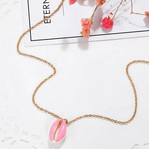 Gold Necklace with Pink Cowrie Pendant